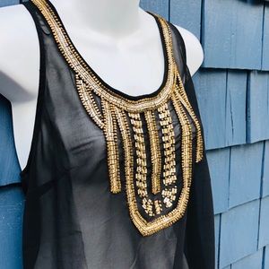 Black with gold accent top